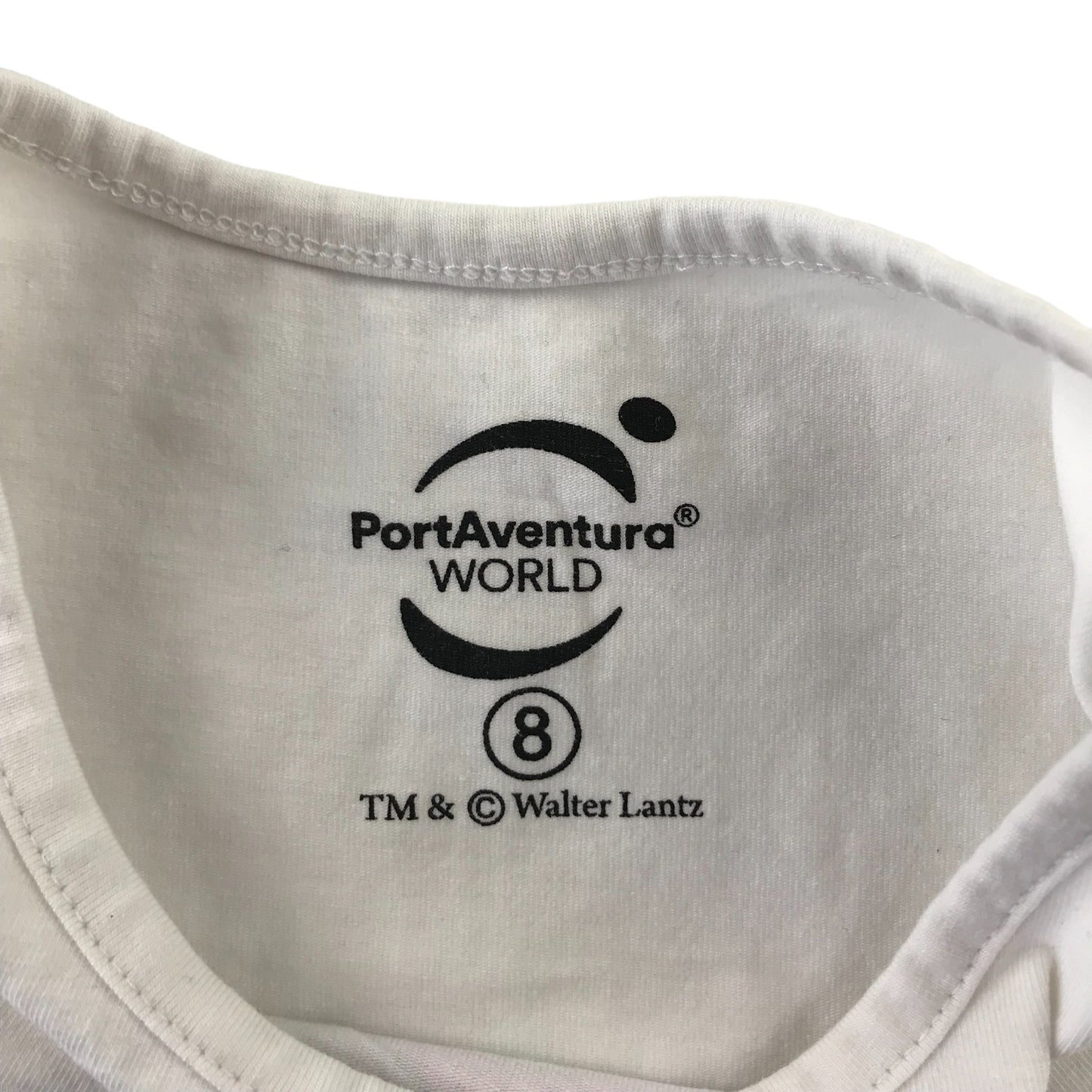 PortAventura t-shirt 7-8 years white short sleeve fringe hem Winnie Woodpecker print