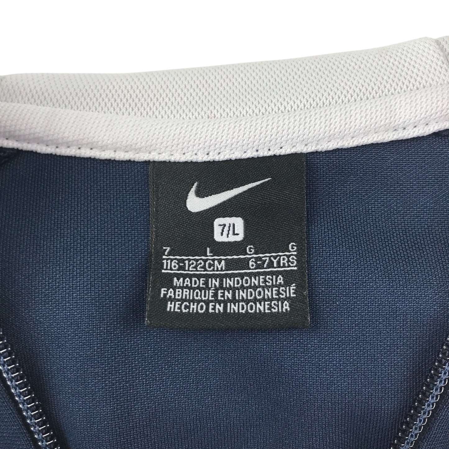 Nike sports hoodie 6-7 years navy full zipper with white shoulder stripes stopping midway