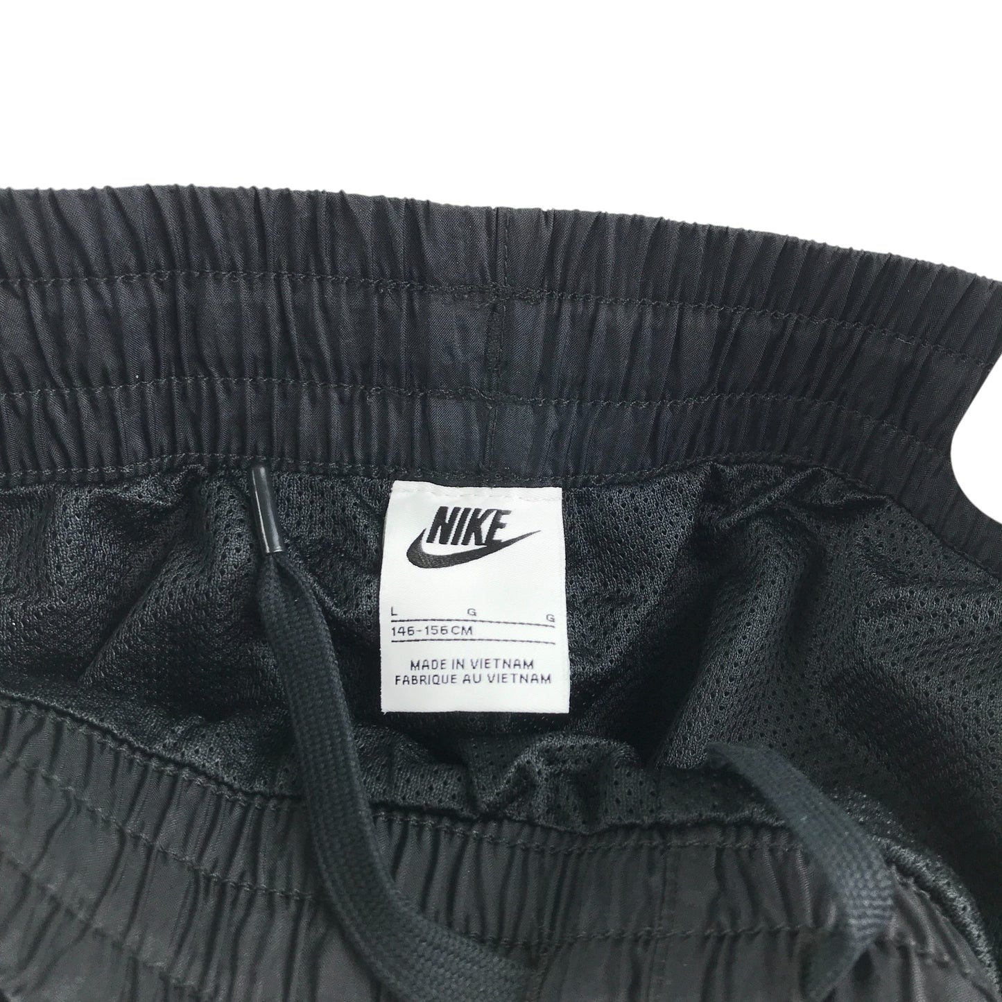 Nike windbreaker trousers 11-13 years black sporty loose fit outdoorsy joggers