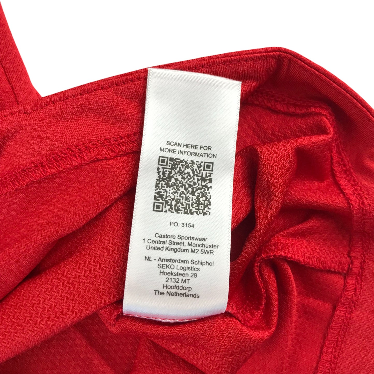 Castore sports top 9-10 years red with white detailing