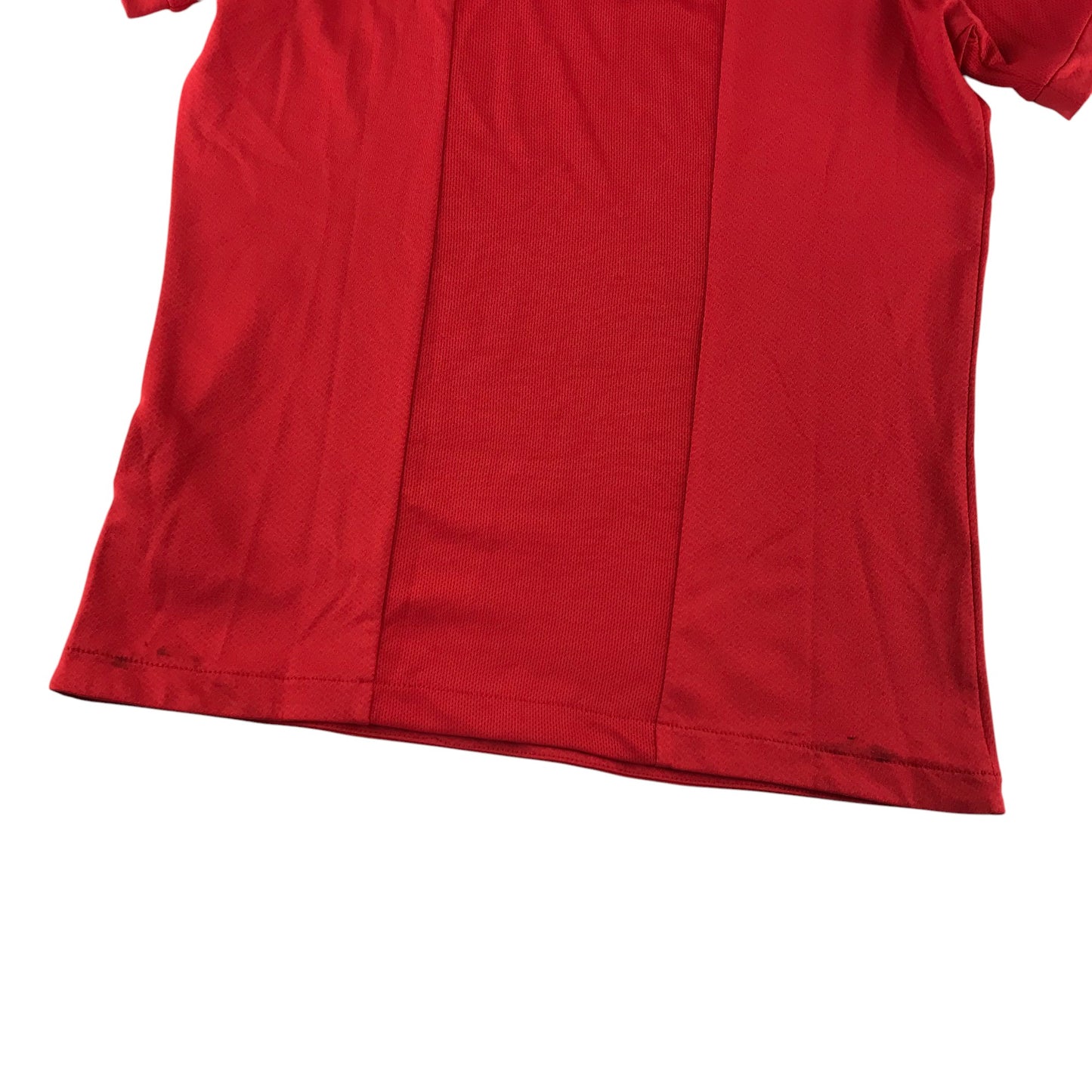 Castore sports top 9-10 years red with white detailing