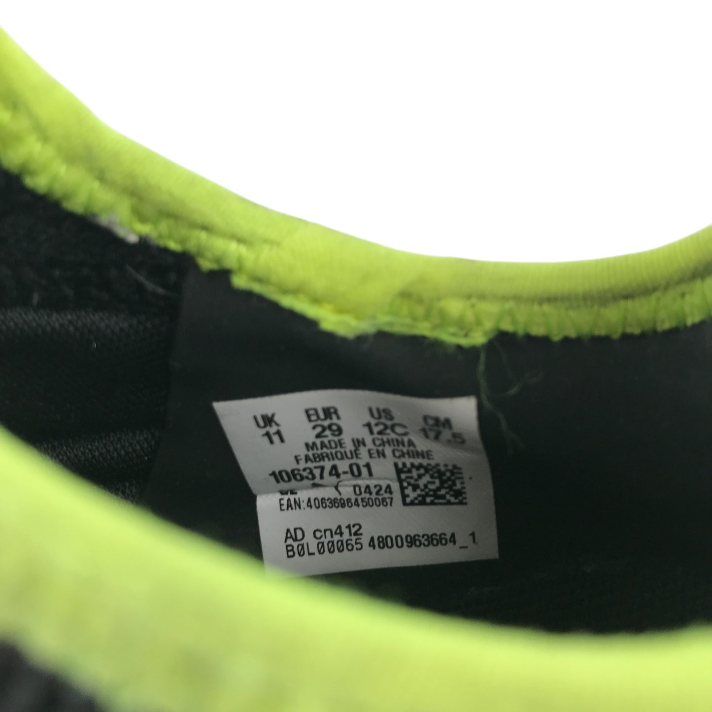 Puma football boots shoe size UK 11 junior black with neon yellow detailing astro turf boots