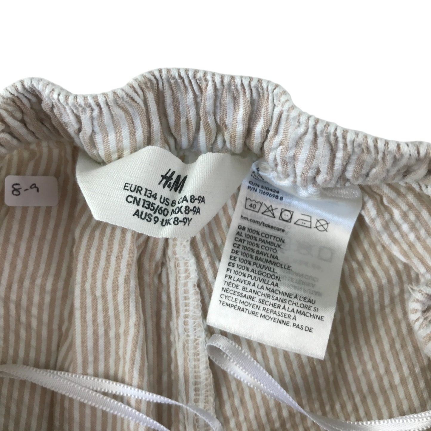 H&M trouser 8-9 years cream and white stripy trousers with elasticated waist cotton