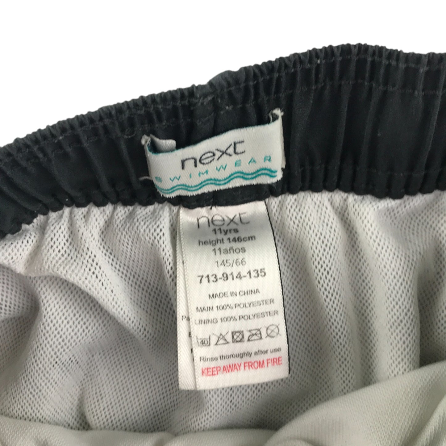 Next swim trunks 10-11 years black with graphic pattern design