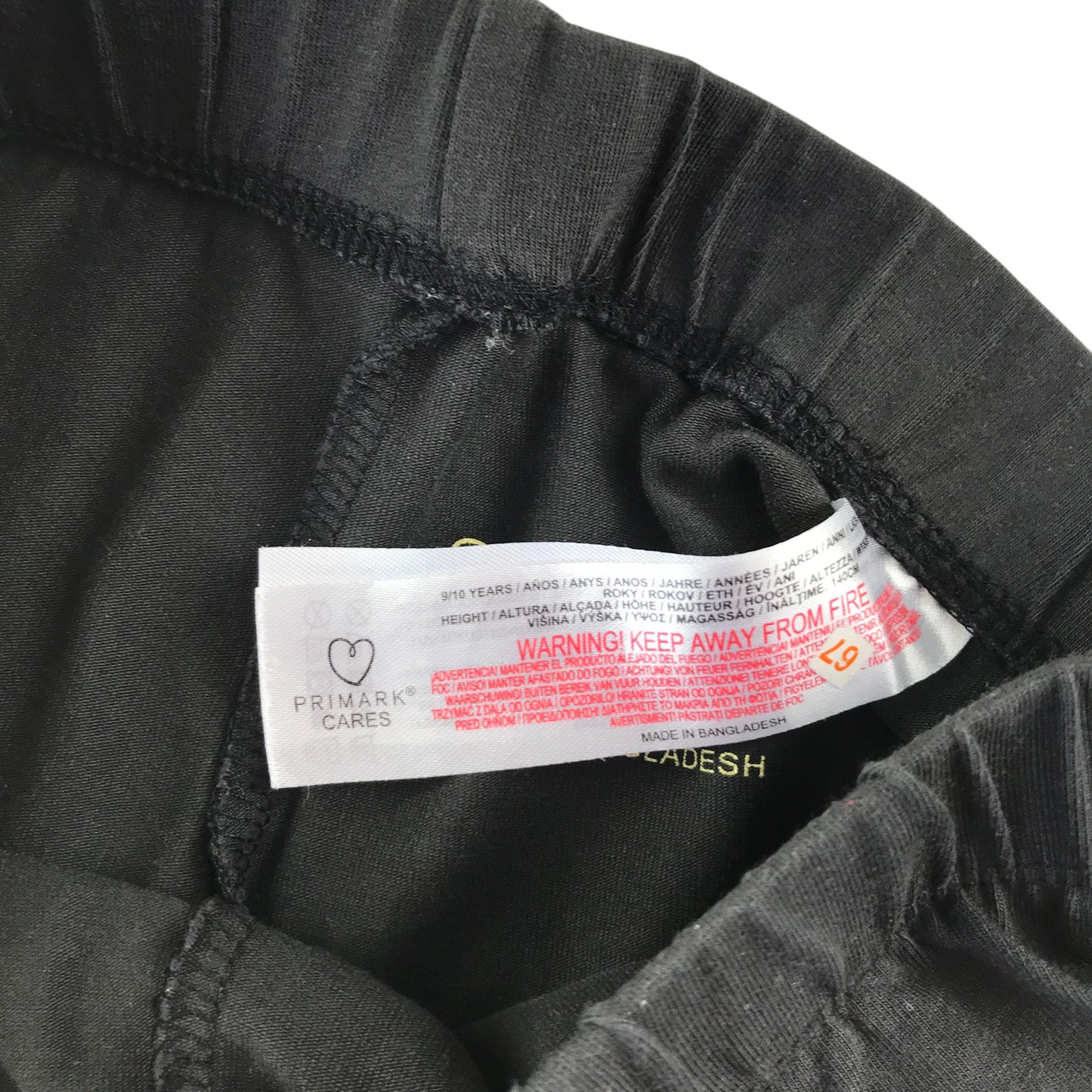 Primark leggings 9-10 years black with text graphic cropped