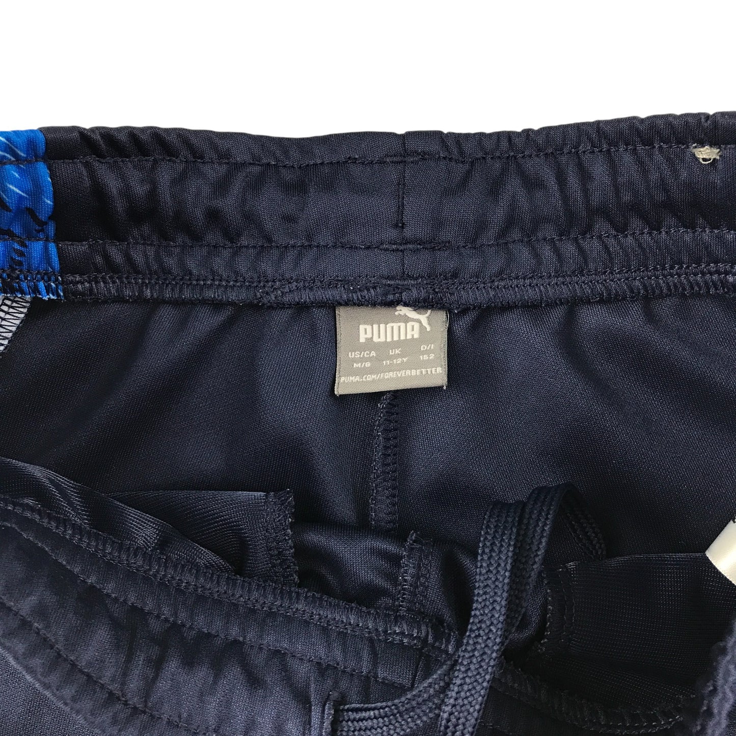 Puma joggers 11-12 years navy with blue side stripes and logo