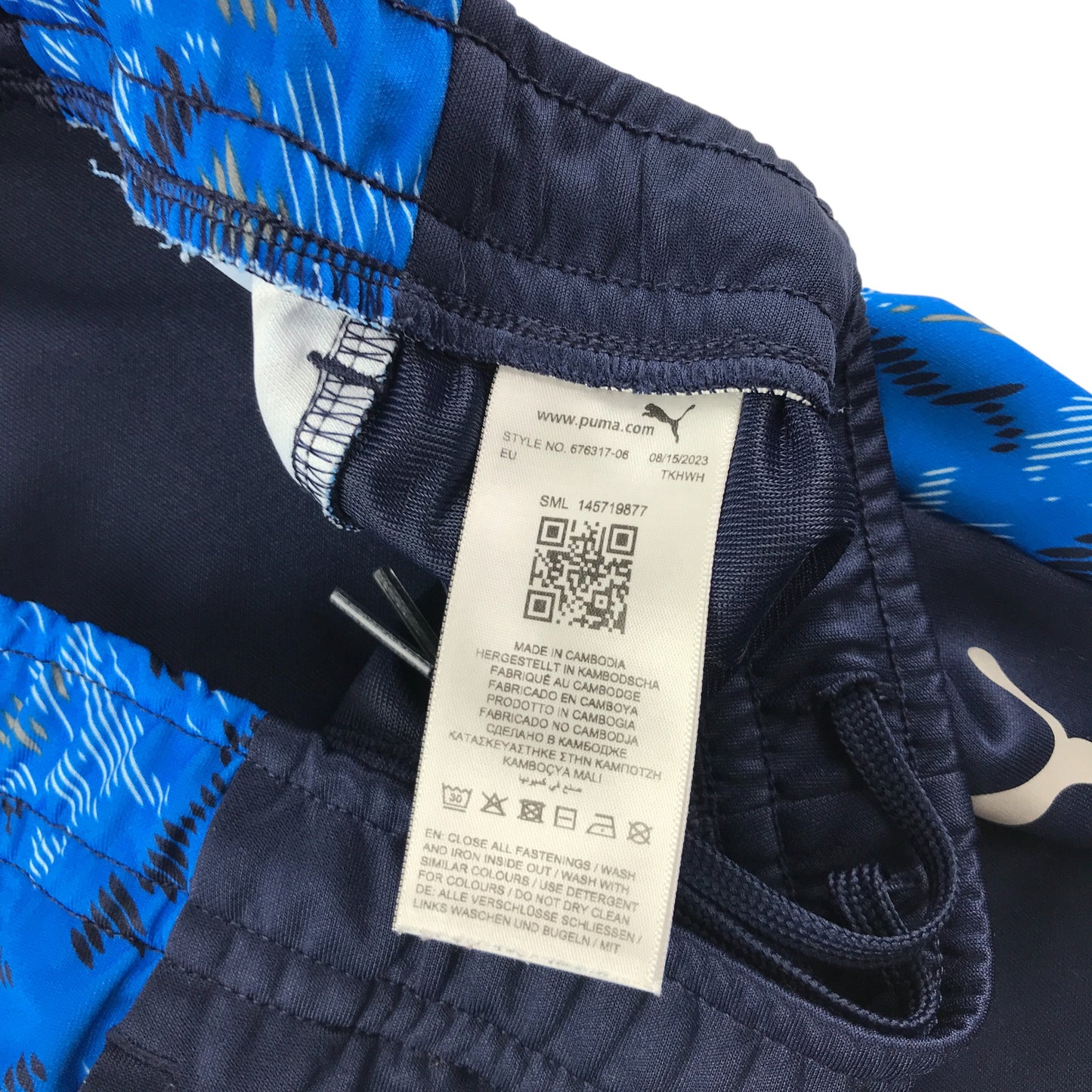 Puma joggers 11-12 years navy with blue side stripes and logo