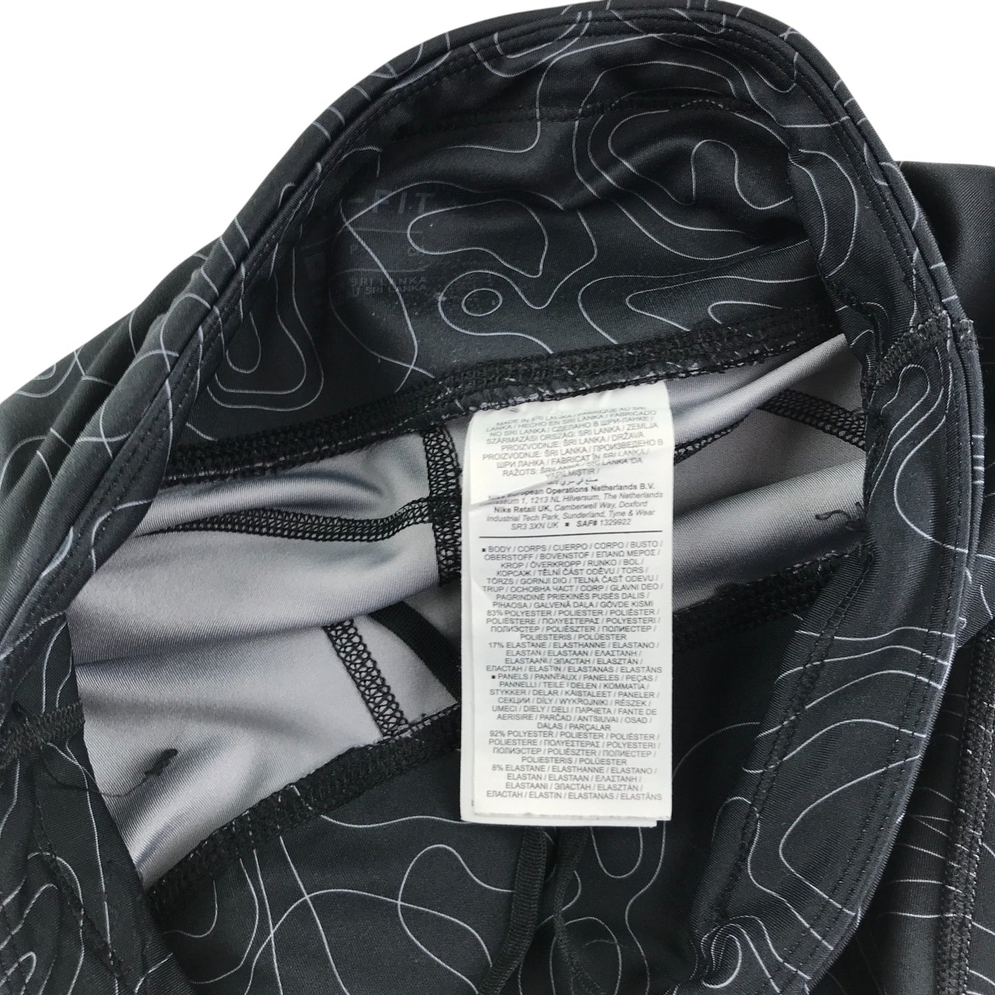 Nike sport leggings women's S black graphic swirl design and logo