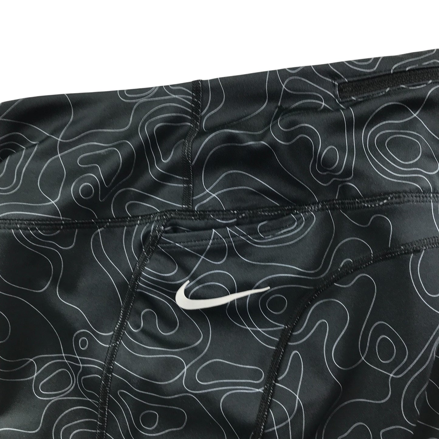 Nike sport leggings women's S black graphic swirl design and logo
