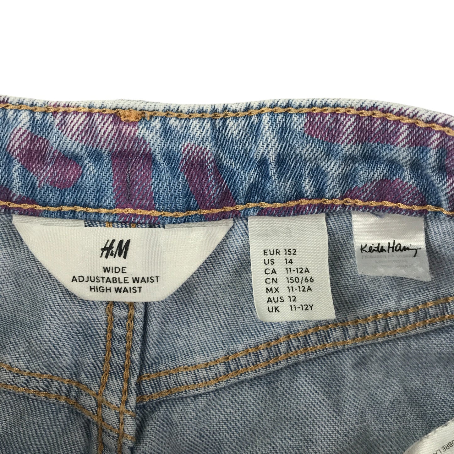 H&M x Keith Haring jean 11-12 year blue with pink graphic design and embroidered love heart patch cotton