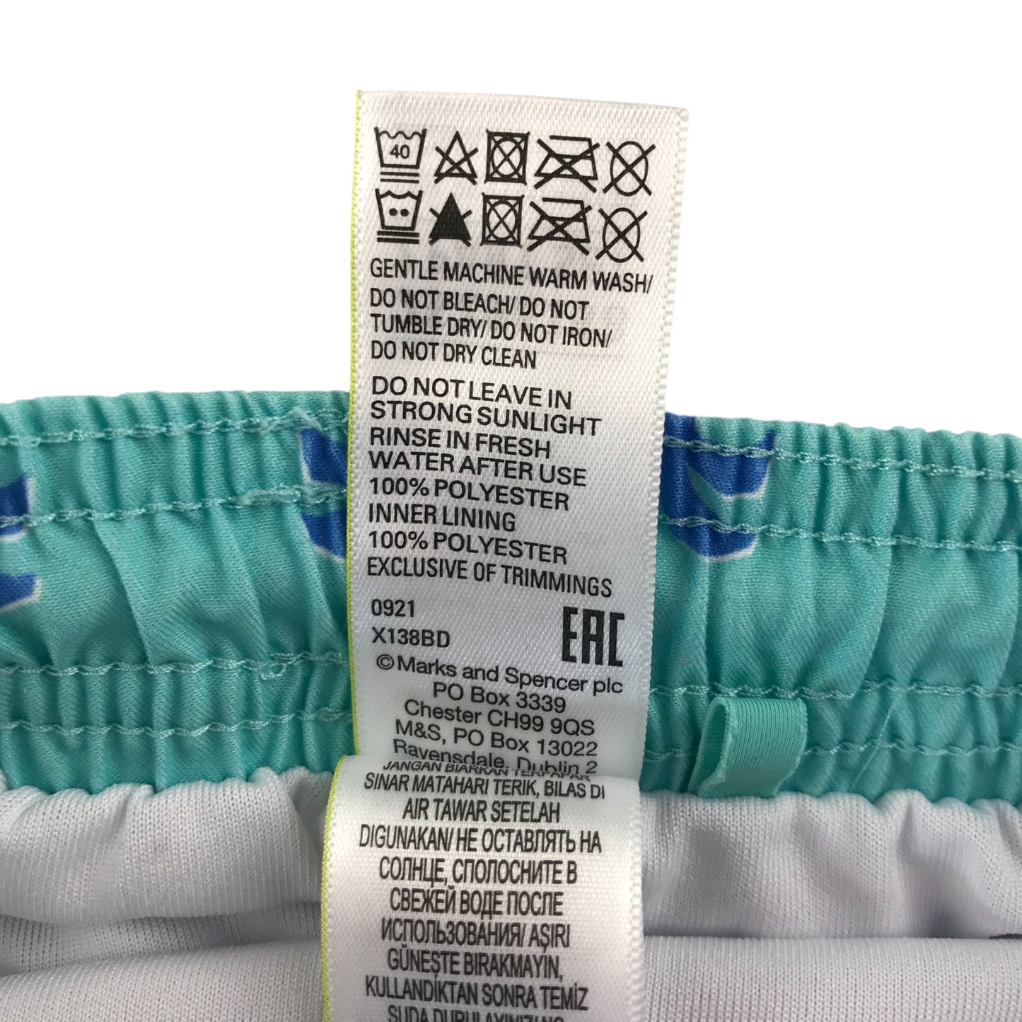 M&S swim trunks 4-5 years blue with palm tree print