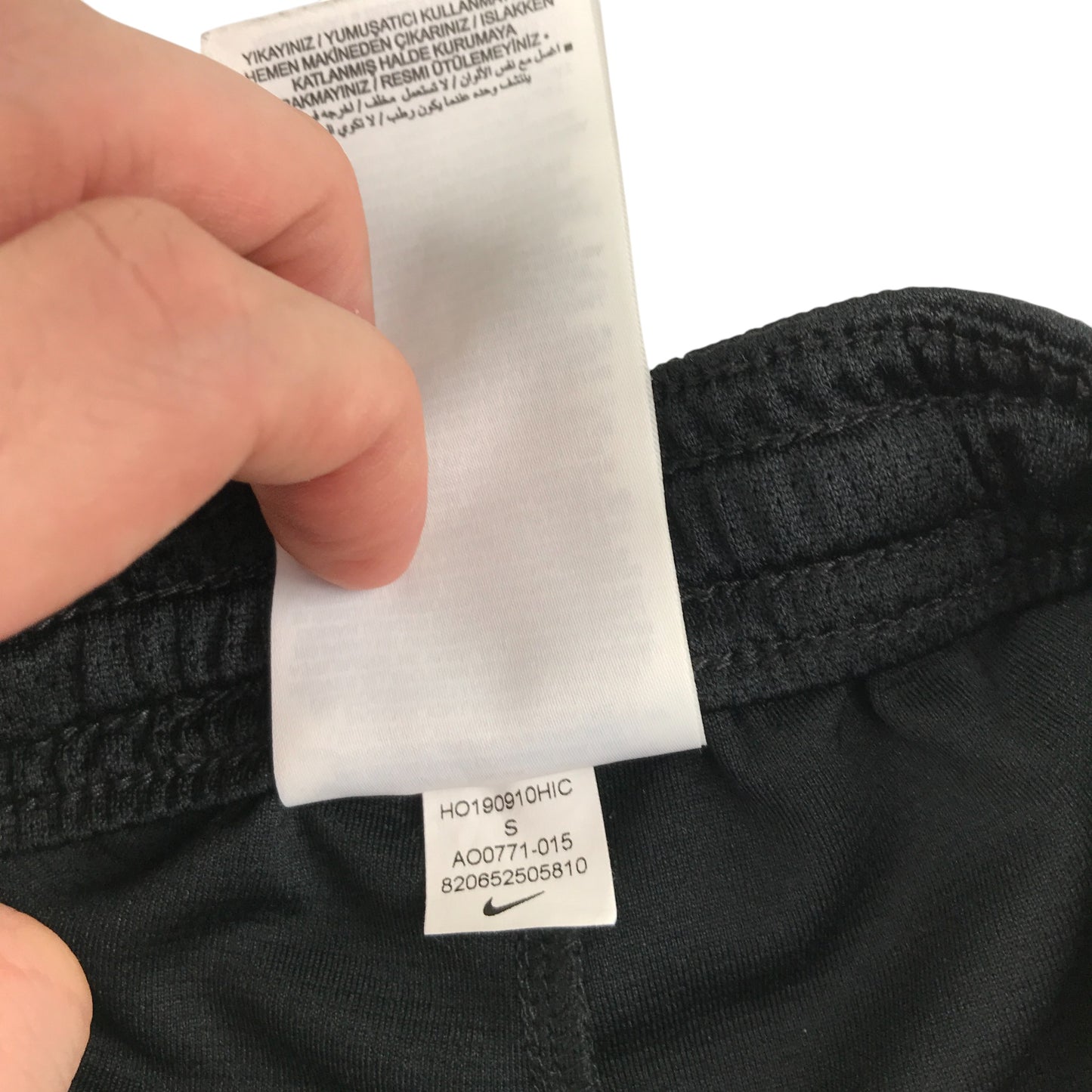 Nike sports short 8-9 years black with white swoosh logo