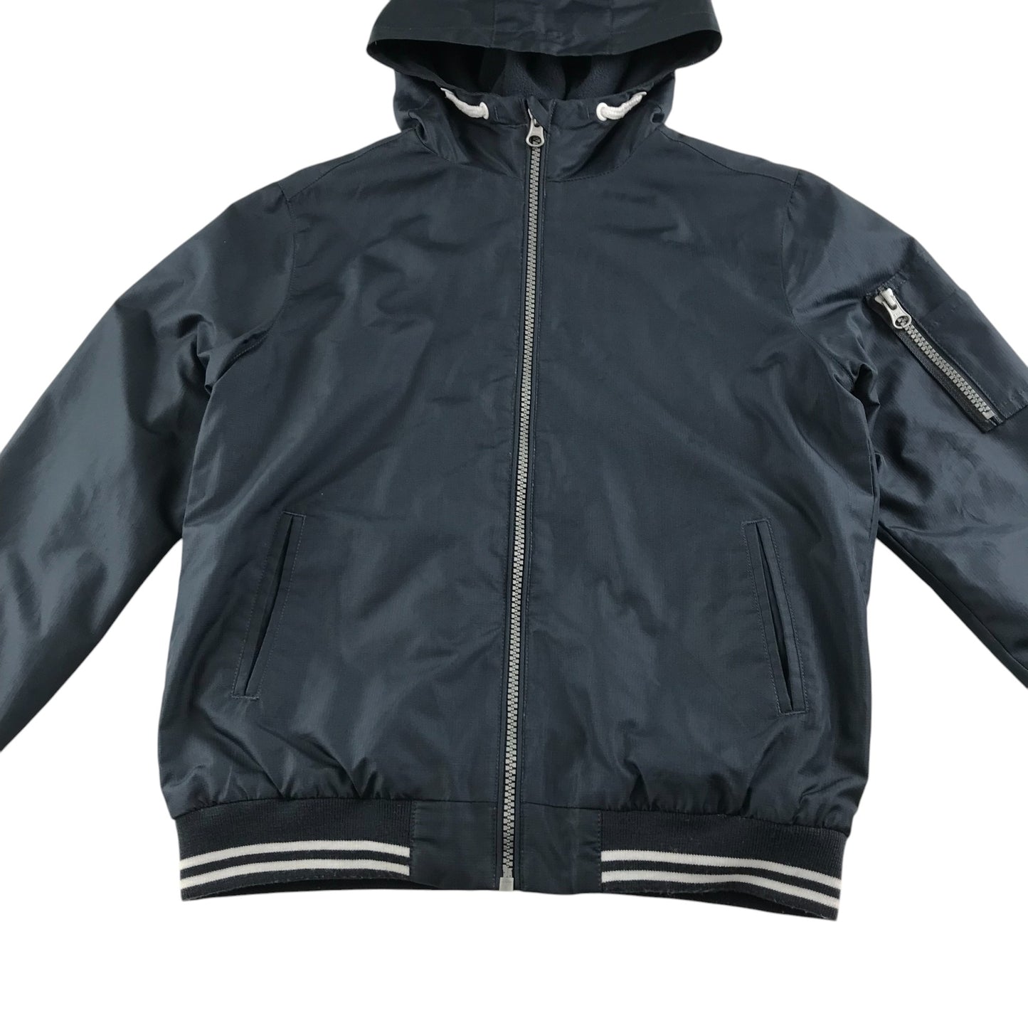 Nutmeg light jacket 8-9 years navy plain jacket with cuffed arms and waist fleece lining