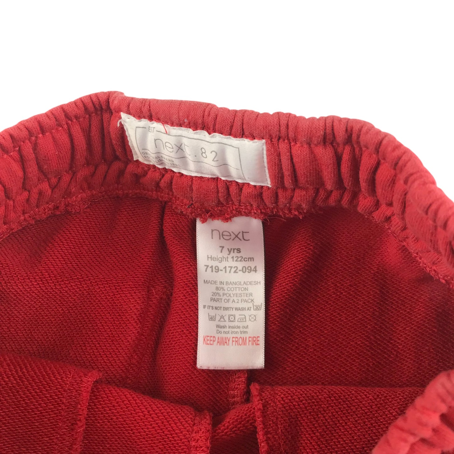 Next shorts 6-7 years red plain with white draw strings jersey material