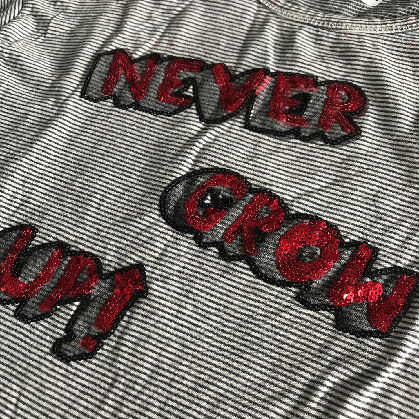 T-shirt - 'Never Grown Up' - Age 7