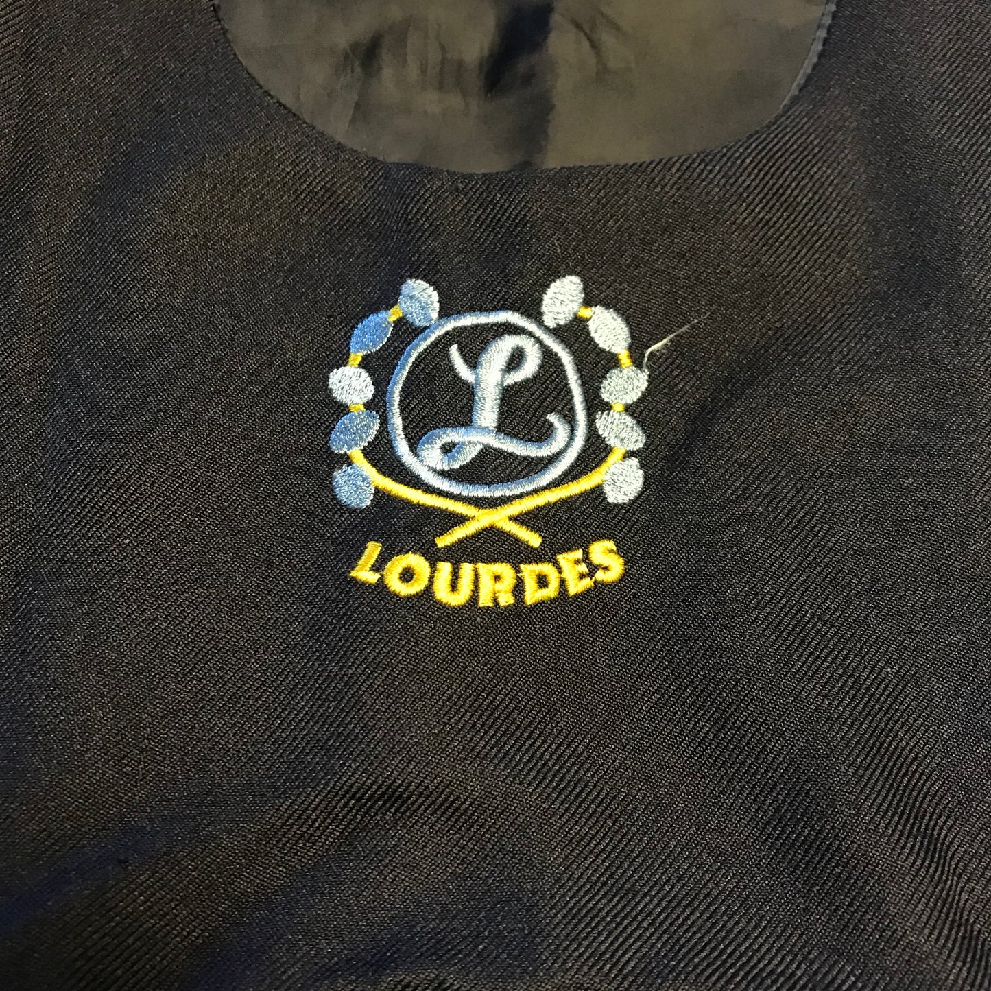 Lourdes Primary Navy Blue Pinafore Bib