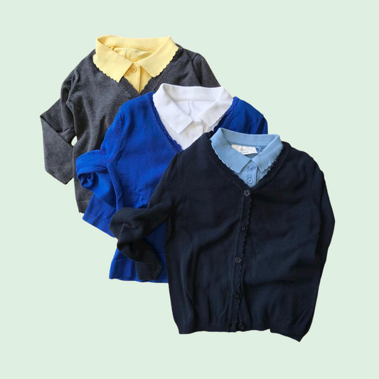 Different colour school uniform tops