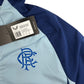 Castore Rangers FC Pro Players Training Rain Jacket - Light Blue