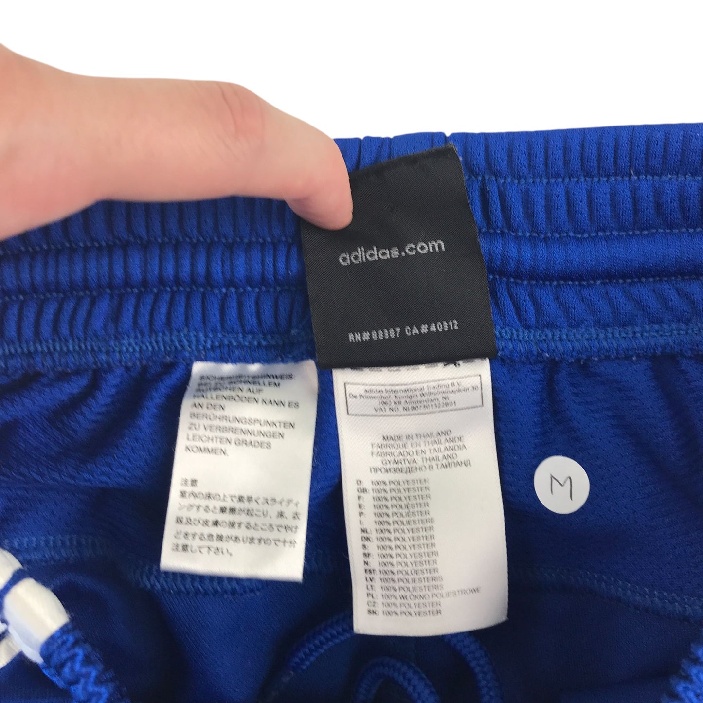 Adidas basketball shorts adult size M blue and white panelled with white three stripes
