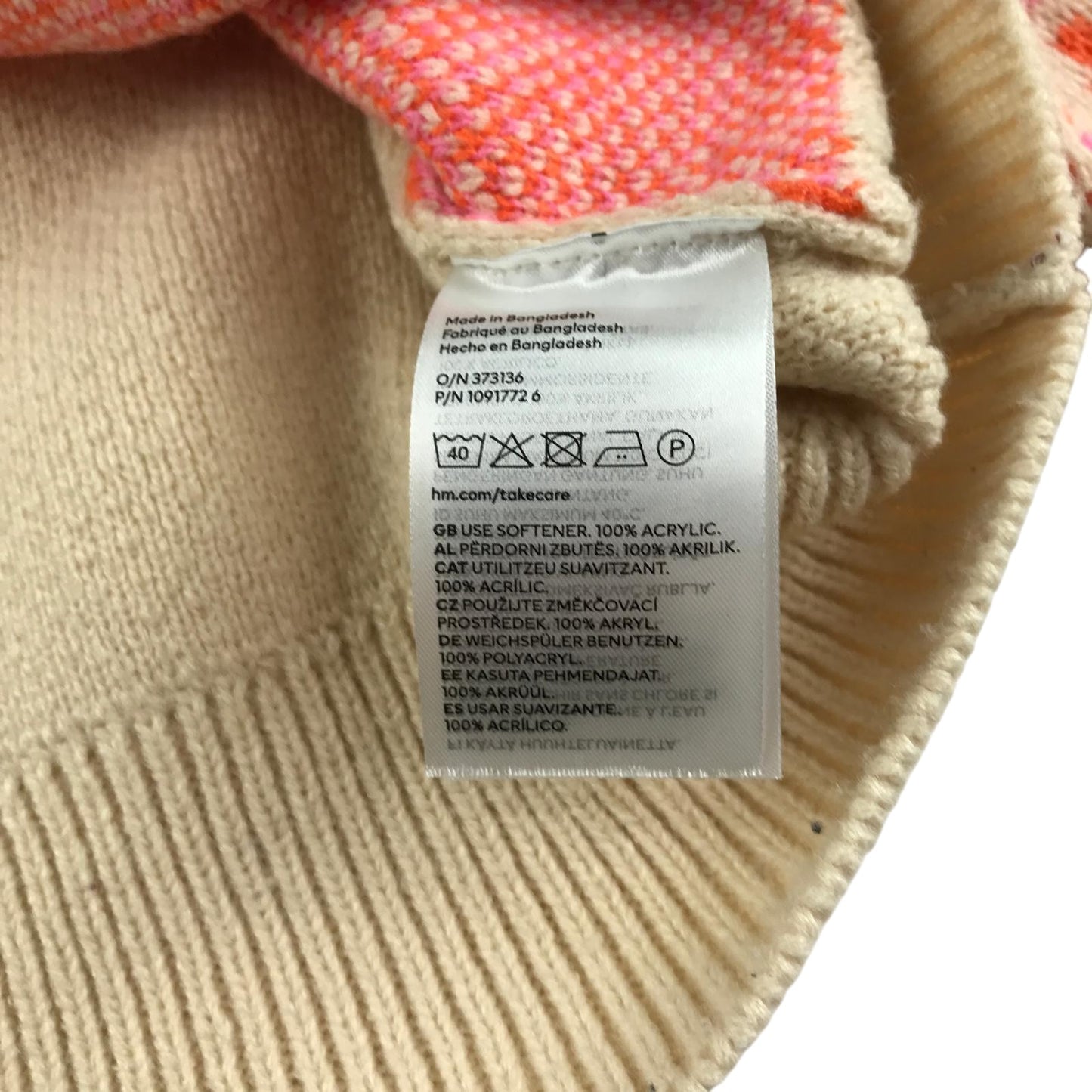 H&M sweater women's S beige with orange and pink pattern design