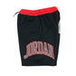 Jordan sports shorts 9-10 years black with red waistband and logos