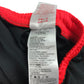 Jordan sports shorts 9-10 years black with red waistband and logos