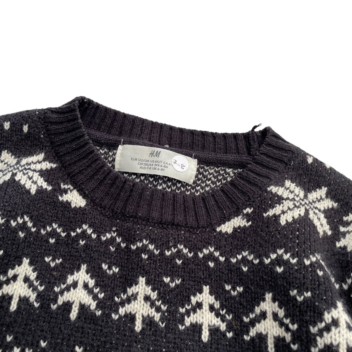 H&M festive jumper 7-8 years charcoal colour with wintery pattern