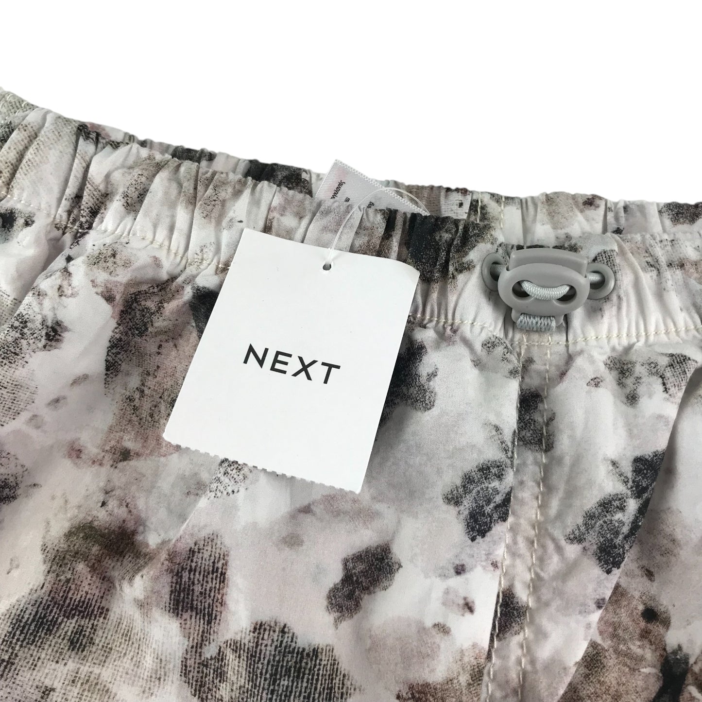 Next trousers 11-12 years white and brown camo style pattern light baggy fit cotton