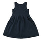 Front and back views of a second-hand girls navy blue jersey pinafore school dress
