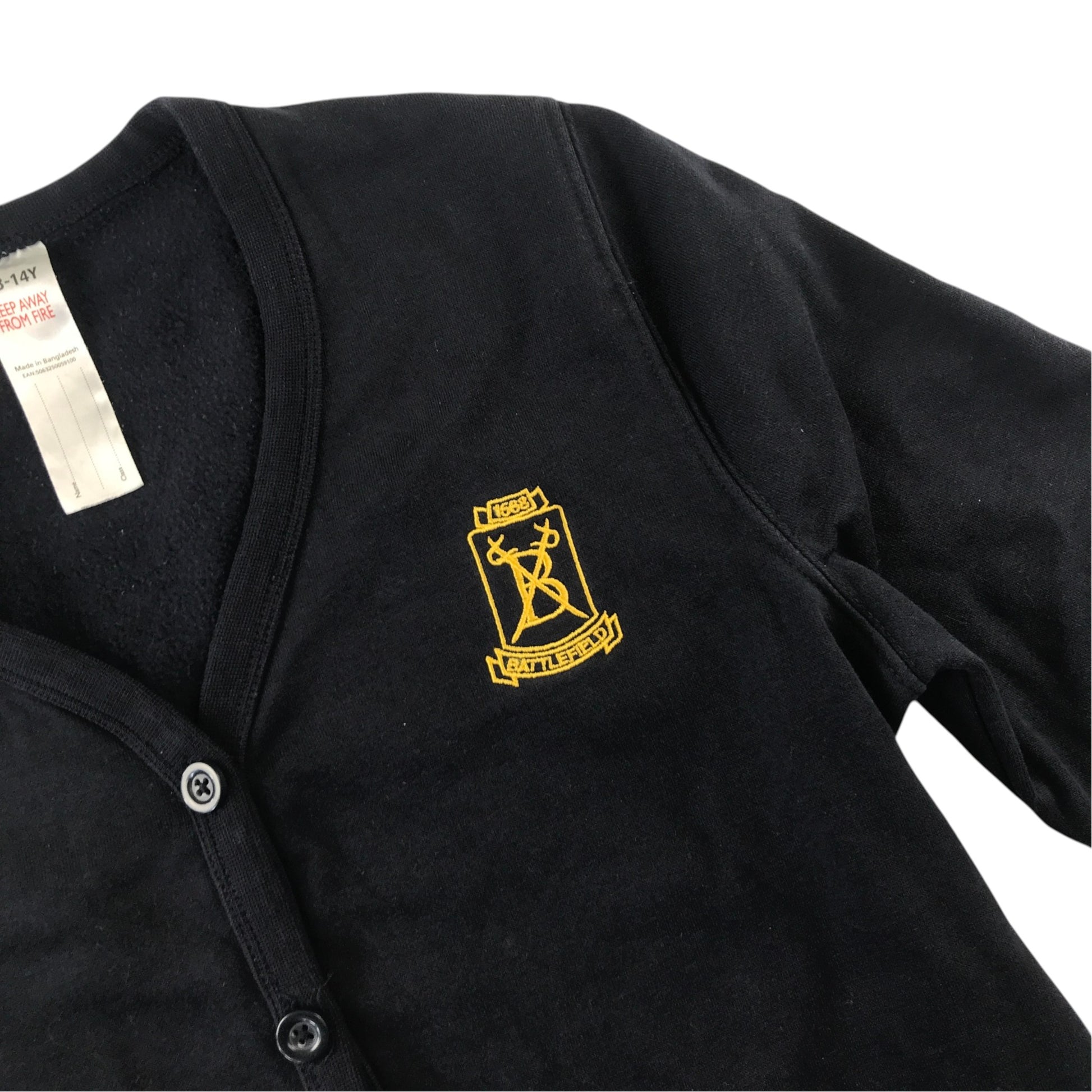 Second-hand Battlefield Primary School navy jersey V-neck cardigan, flat lay view with embroidered badge.