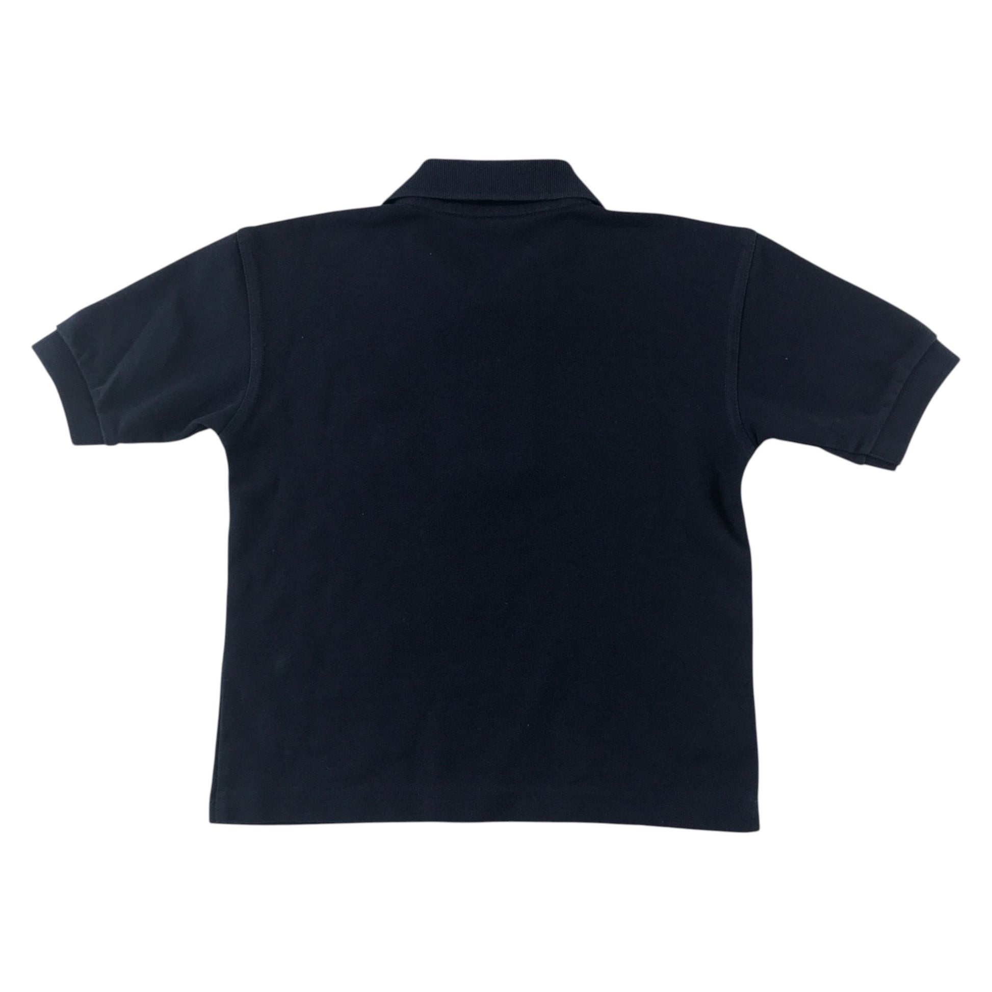 Second-hand Battlefield Primary School navy blue polo shirt, flat lay view with embroidered badge.