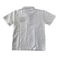 Second-hand Eastbank Primary School unisex white polo shirt, flat lay view with embroidered school badge.