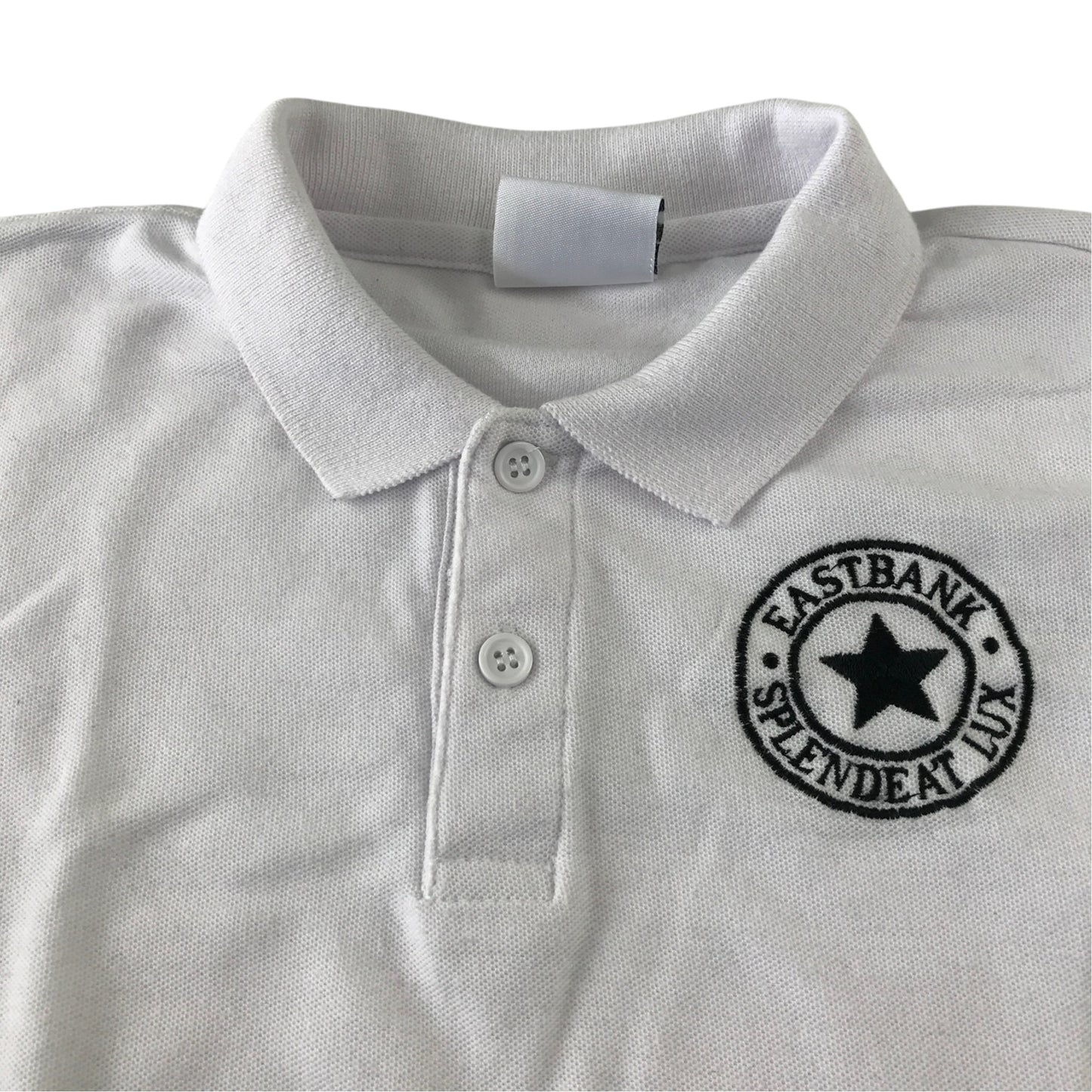 Second-hand Eastbank Primary School unisex white polo shirt, flat lay view with embroidered school badge.