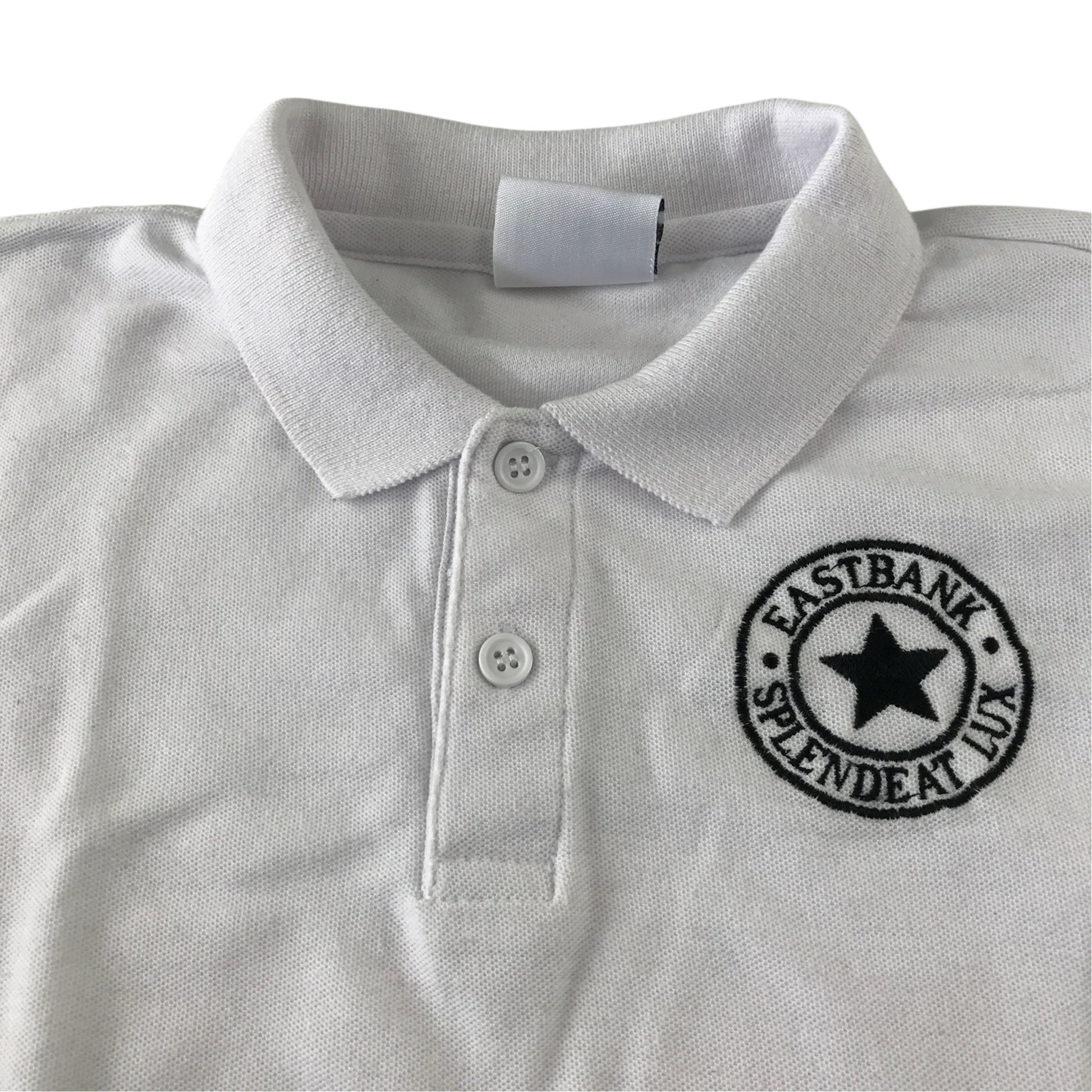 Second-hand Eastbank Primary School unisex white polo shirt, flat lay view with embroidered school badge.