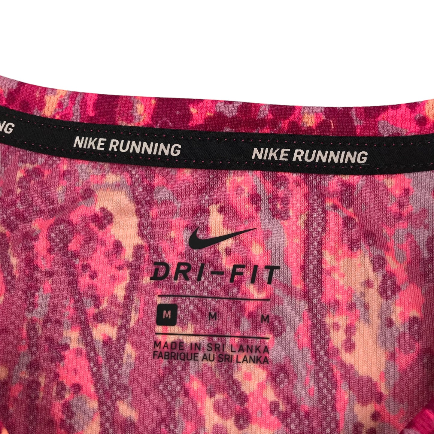 Nike Running sports top women's M pink graphic design