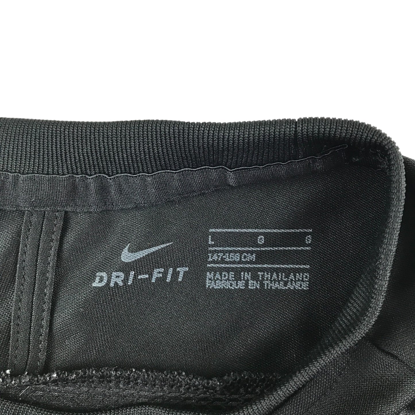 Nike sport top 11-12 years black with white detailing on sleeves