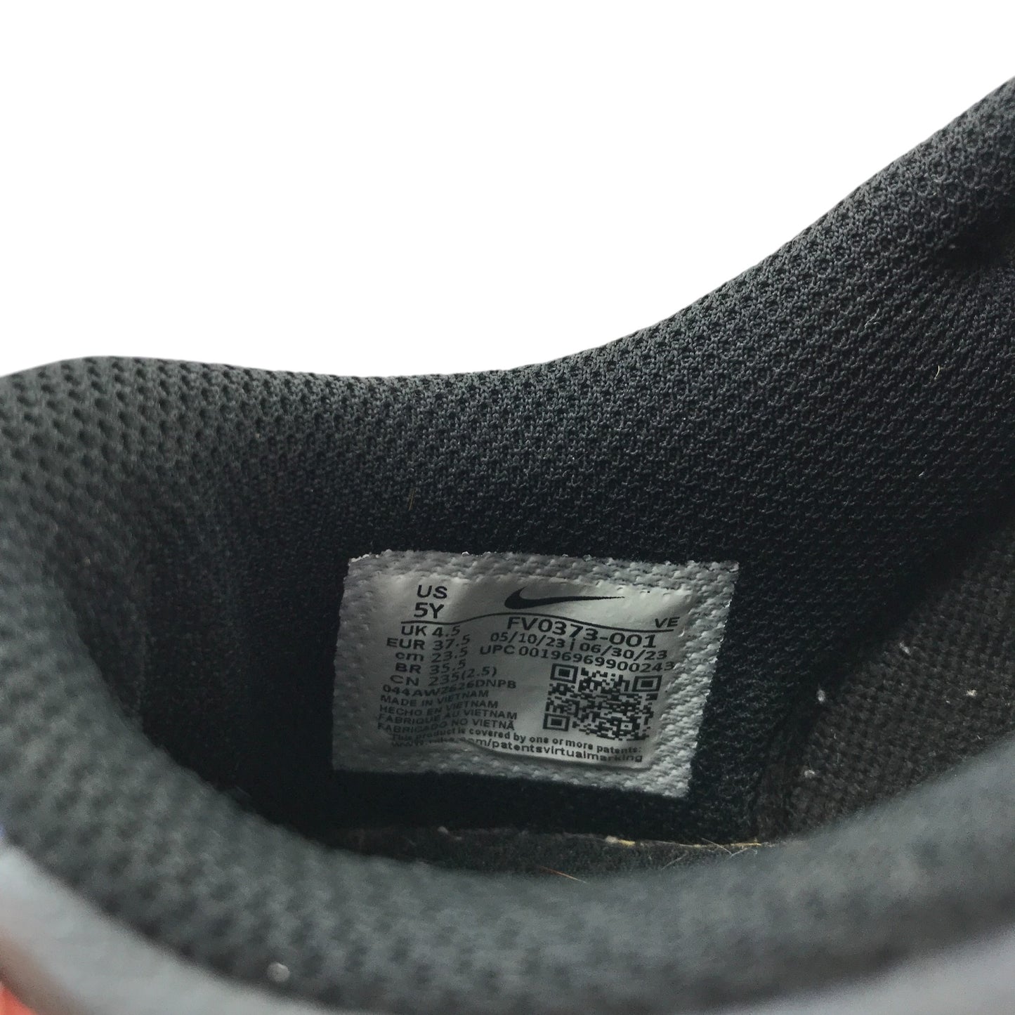 Nike trainers shoe size 4.5 grey and black with red swoosh logo and white outer soles