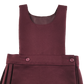 Burgundy bib style school pinafore
