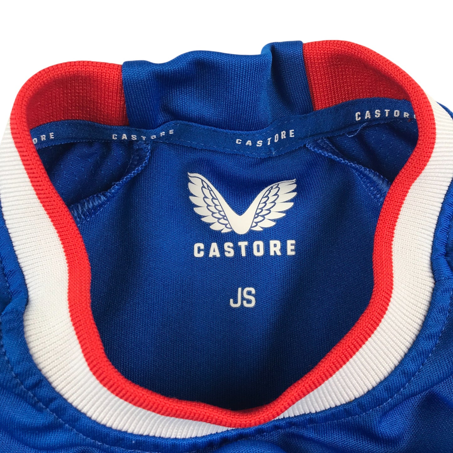 Castore sports top 8-9 years blue Rangers stripe shirt