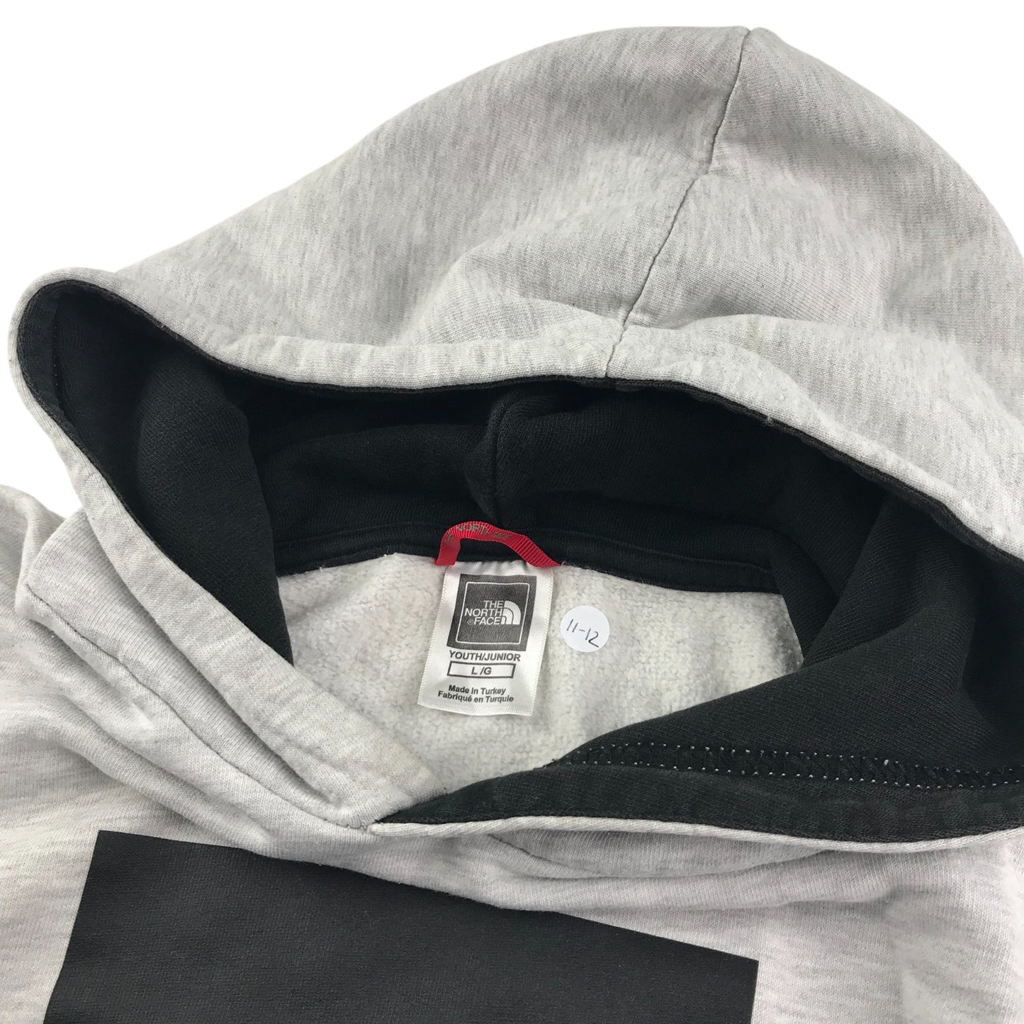 The North Face hoodie 11-12 years light grey with graphic logo