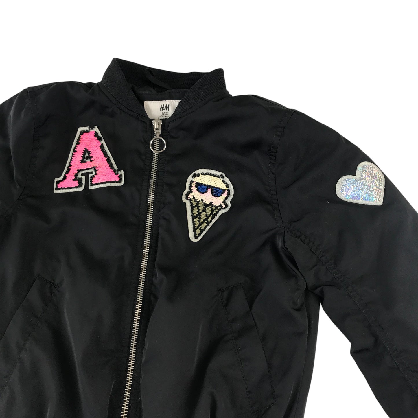 H&M light jacket 8-9 years black bomber style cuffed arms and waist with sequin patches