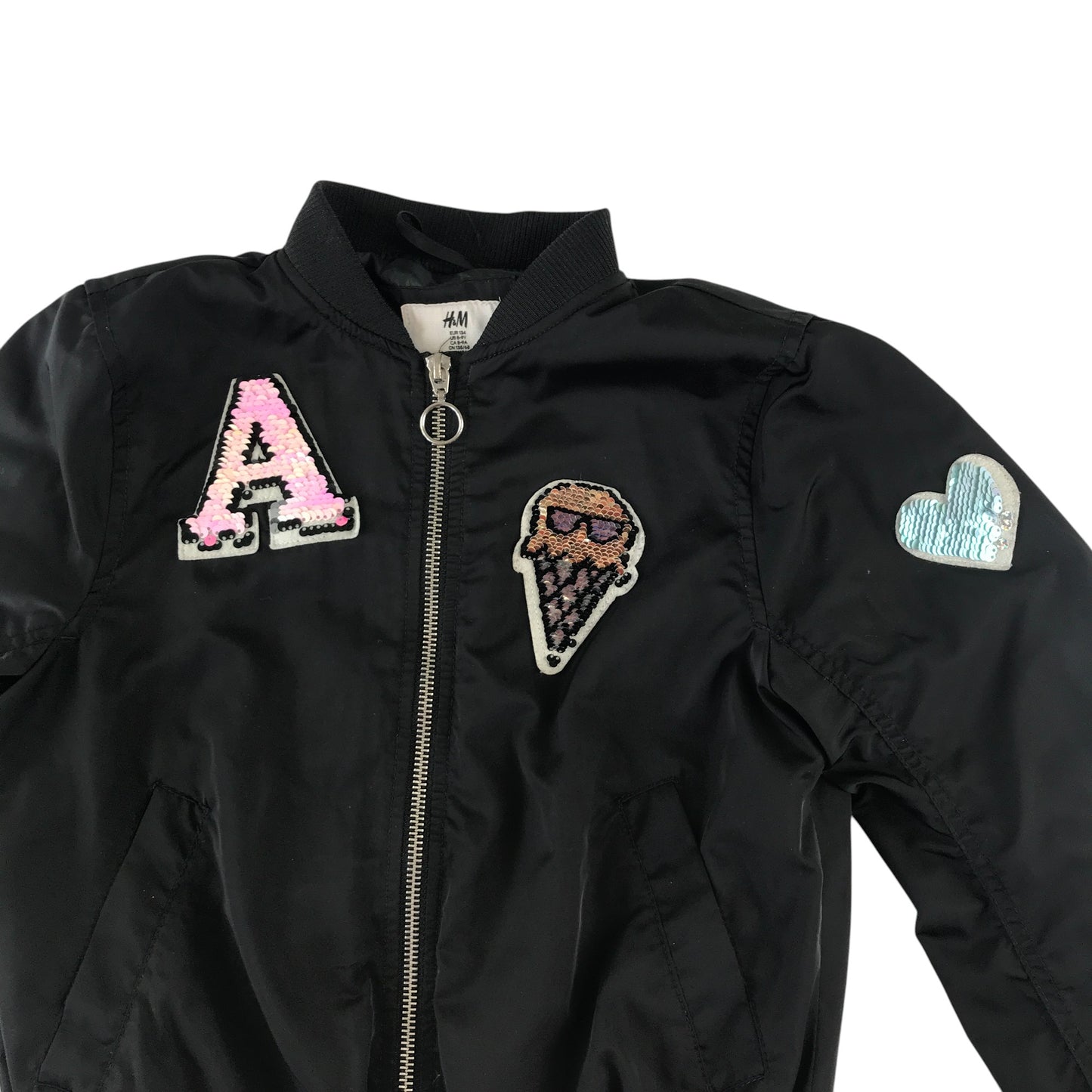 H&M light jacket 8-9 years black bomber style cuffed arms and waist with sequin patches