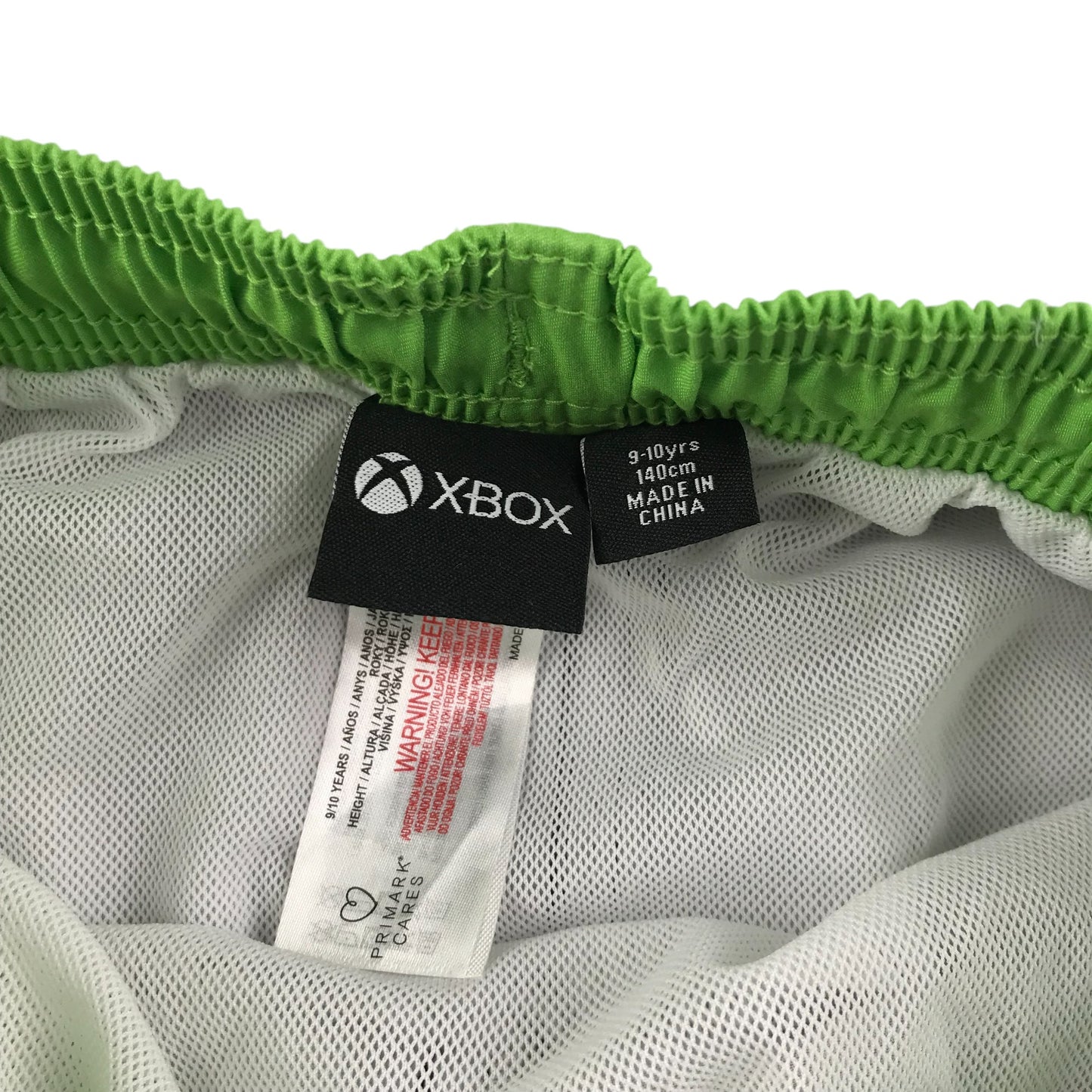 Primark swim trunks 9-10 years black and green Xbox print shorts