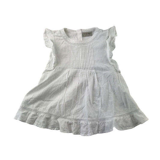 Next blouse 8 years white sleeveless with butterfly frills on shoulders cotton