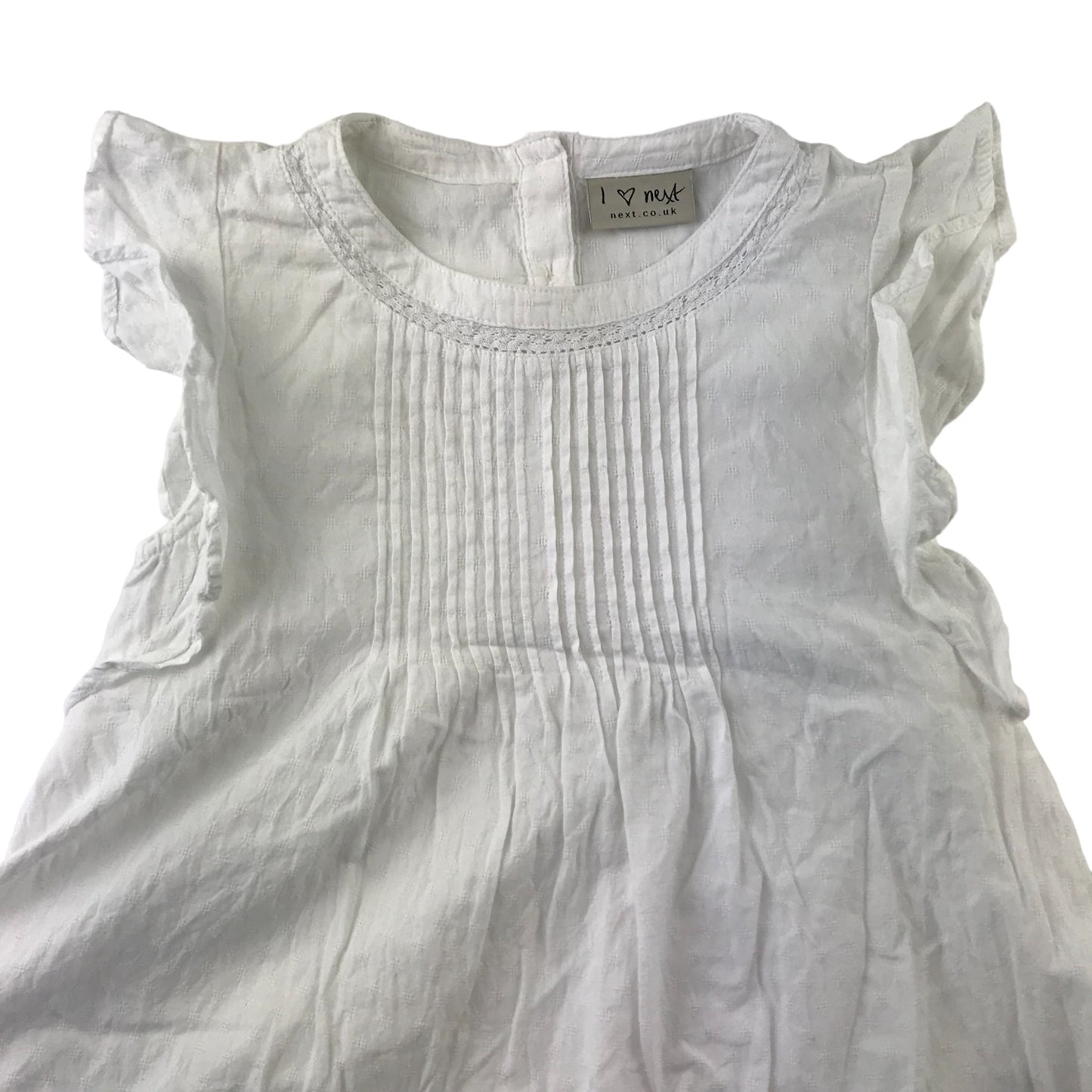 Next blouse 8 years white sleeveless with butterfly frills on shoulders cotton