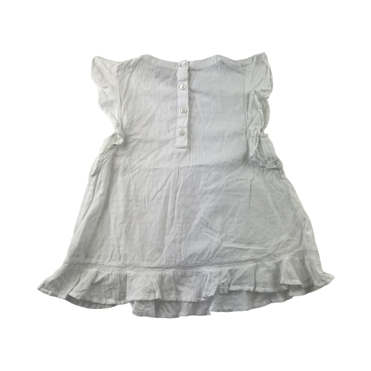 Next blouse 8 years white sleeveless with butterfly frills on shoulders cotton