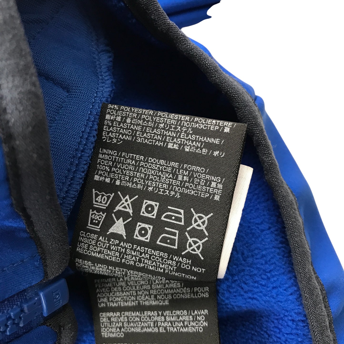 Jack Wolfskin jacket 11-12 years blue and grey waterproof hard shell warm fleece lining