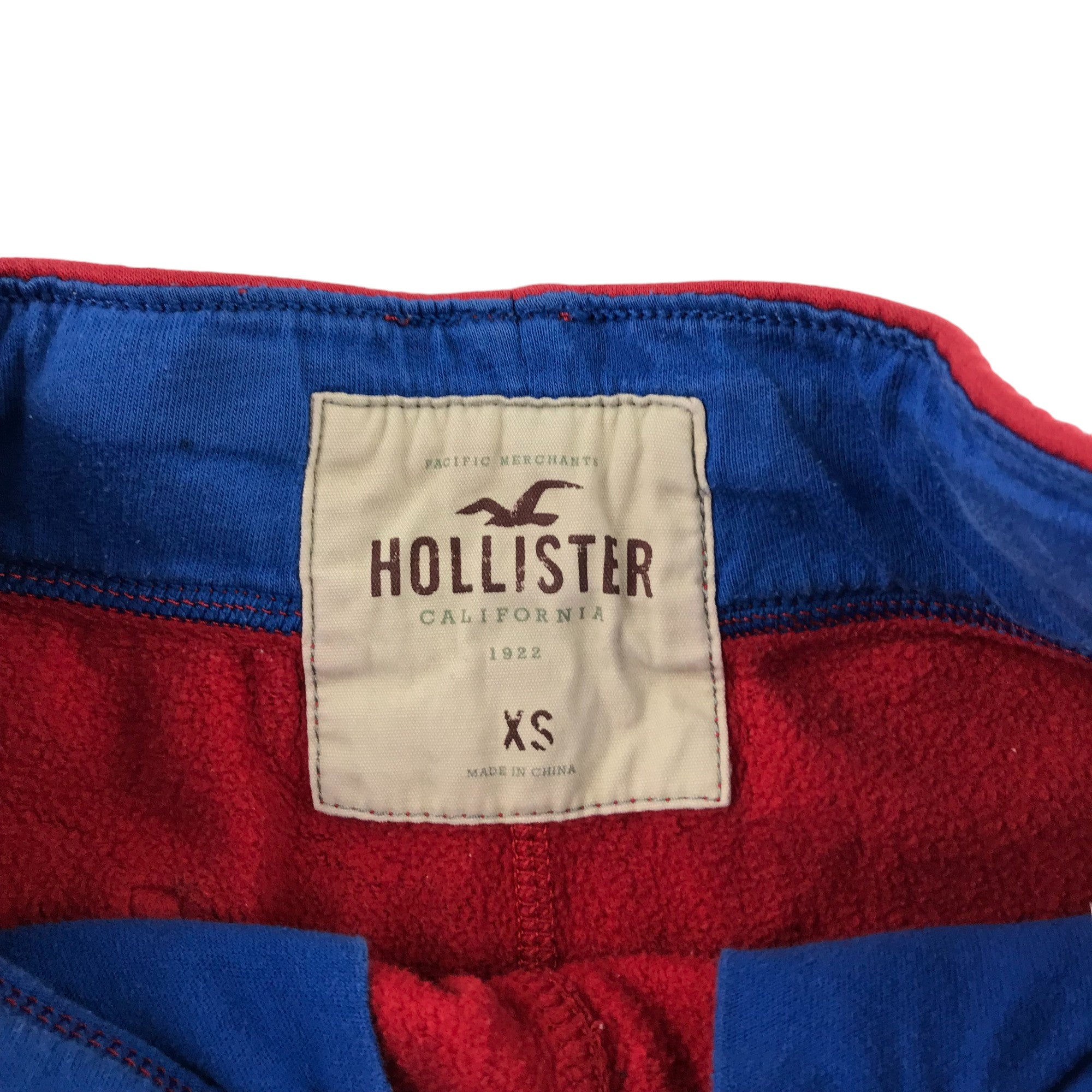 Hollister shorts XS size red jersey style with blue logo ApparelXchange CIC