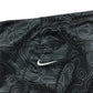 Nike sport leggings women's S black graphic swirl design and logo