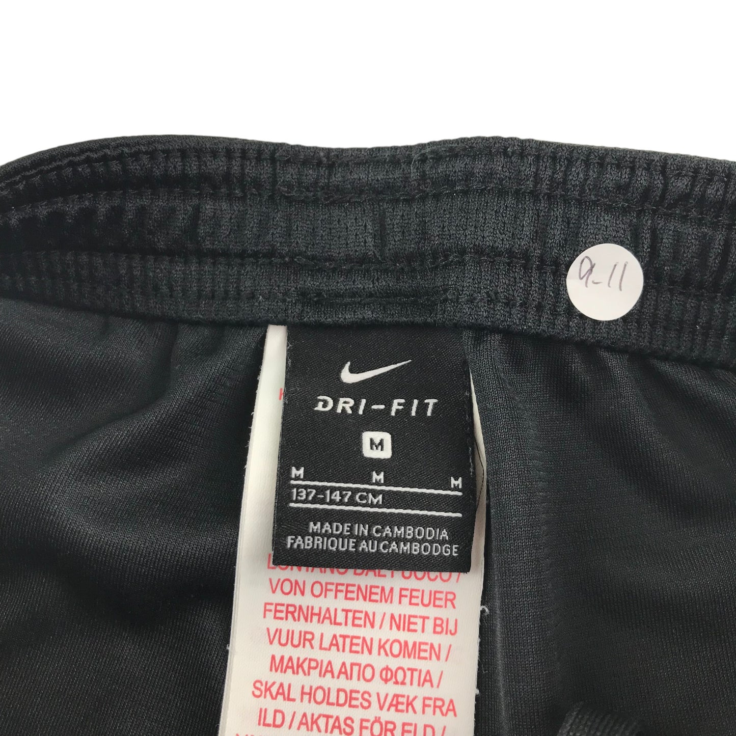 Nike sport shorts 9-10 years black with white detailing and logo